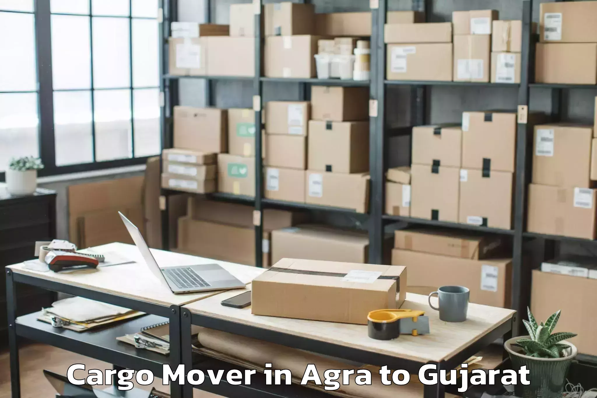 Top Agra to Gujarat Ayurved University Jam Cargo Mover Available